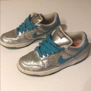Metallic and teal Nike sneakers